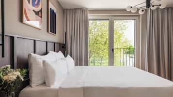 Phòng Suite Tiêu chuẩn | 1 phòng ngủ, bộ đồ giường cao cấp, két bảo mật tại phòng