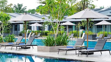 Outdoor pool, open 6:00 AM to 10:00 PM, free cabanas, pool umbrellas