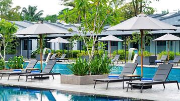 Outdoor pool, open 6:00 AM to 10:00 PM, free cabanas, pool umbrellas