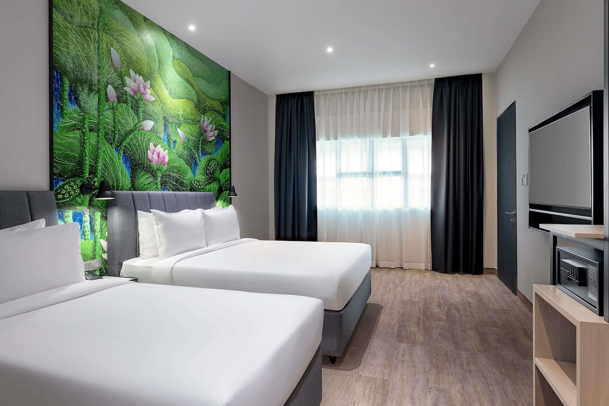 Family Room (1 Queen Bed and 1 Single Bed) | Minibar, in-room safe, individually decorated, individually furnished