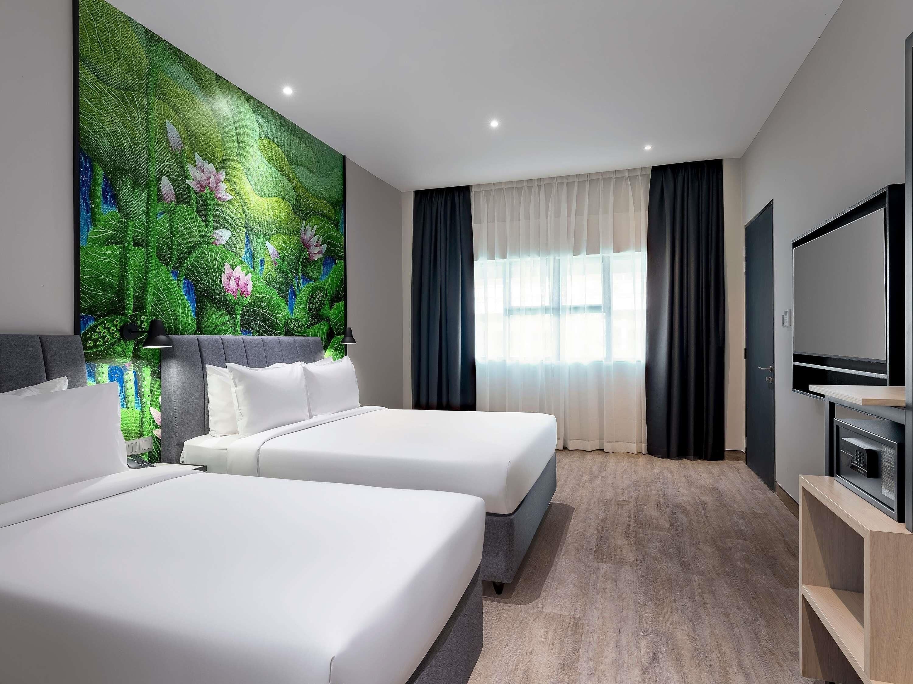 Family Room (1 Queen Bed and 1 Single Bed) | Minibar, in-room safe, desk, blackout curtains