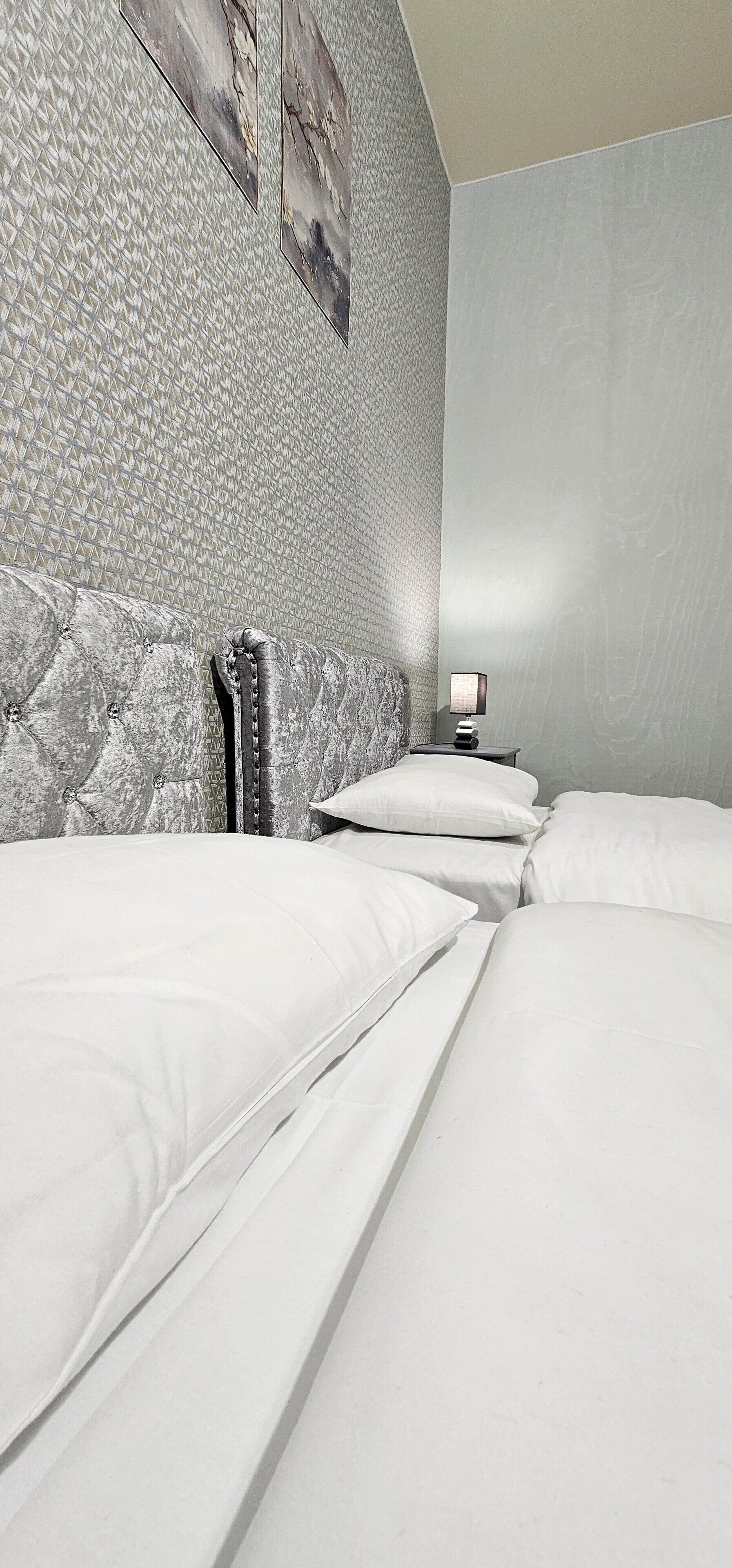 Premium bedding, memory foam beds, desk, soundproofing
