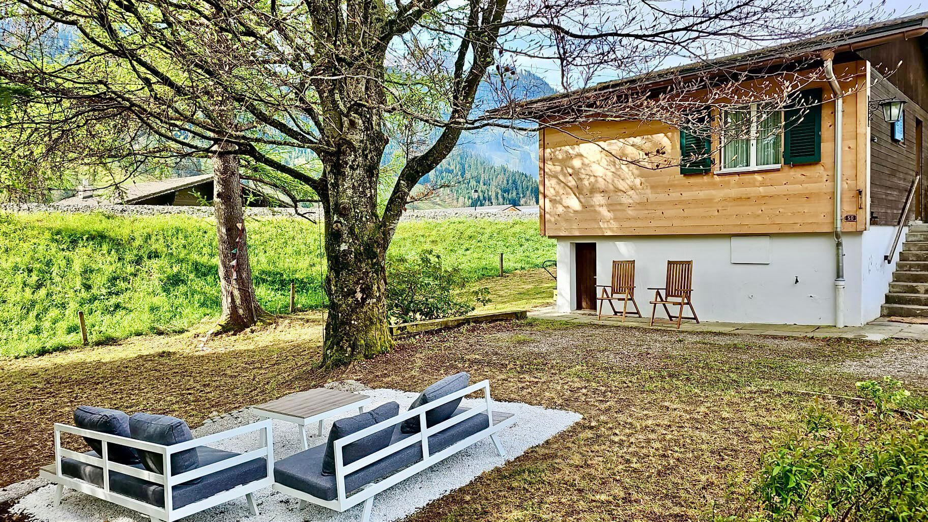 Charming Rougemont chalet with a serene alpine yard