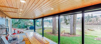 Riverfront all-suite home with amazing views, covered deck, & BBQ