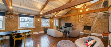 Family Penthouse | Living area | 50-inch Smart TV with digital channels