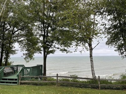 Lakefront Cottage with 100ft Private Sandy Beach!
