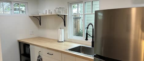 Fridge, microwave, coffee/tea maker, electric kettle