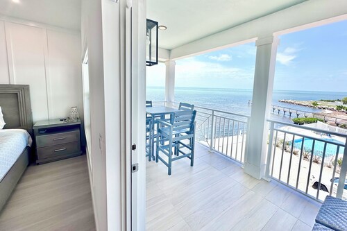 Oceanfront Panoramic Bliss • 3 Stories, Paddleboards, Gameroom & Boat Dockage