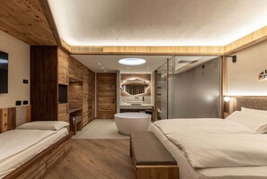 Deluxe Studio Suite, Balcony, Mountain View | Hypo-allergenic bedding, down duvets, memory-foam beds, in-room safe - Hotel Mirabello - Slow Hotel Benessere (Fiera di Primiero)