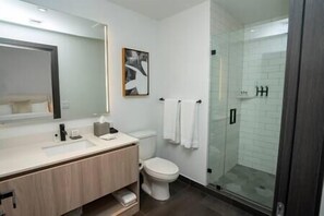 Hair dryer, towels, soap, shampoo