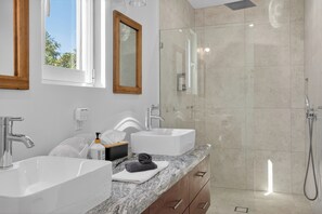Shower, hair dryer, towels, soap