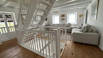 Romantic Apartment, 2 Bedrooms, Lake View | Living area | 140-cm Smart TV with digital channels