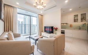 Deluxe Apartment, 2 Bedrooms, Balcony, City View | Living area - Vinhomes Central Park Riverside Elegance (Ho Chi Minh City)