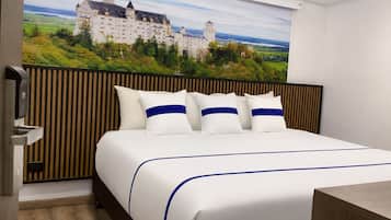 Standard Room, City View | Premium bedding, down comforters, pillowtop beds, desk