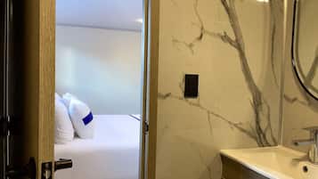 Premium bedding, down comforters, pillowtop beds, desk