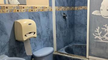 Bidet, towels, soap, shampoo