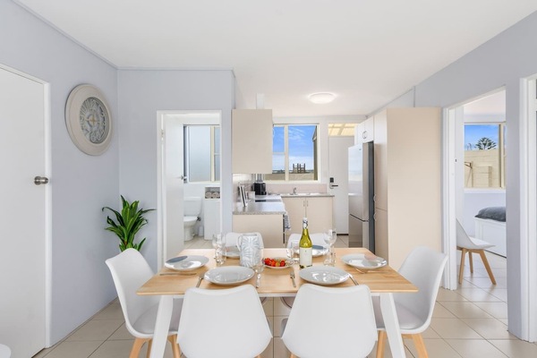 Share a meal around the dining table or use this space for setting up a laptop if you’re on a working holiday.