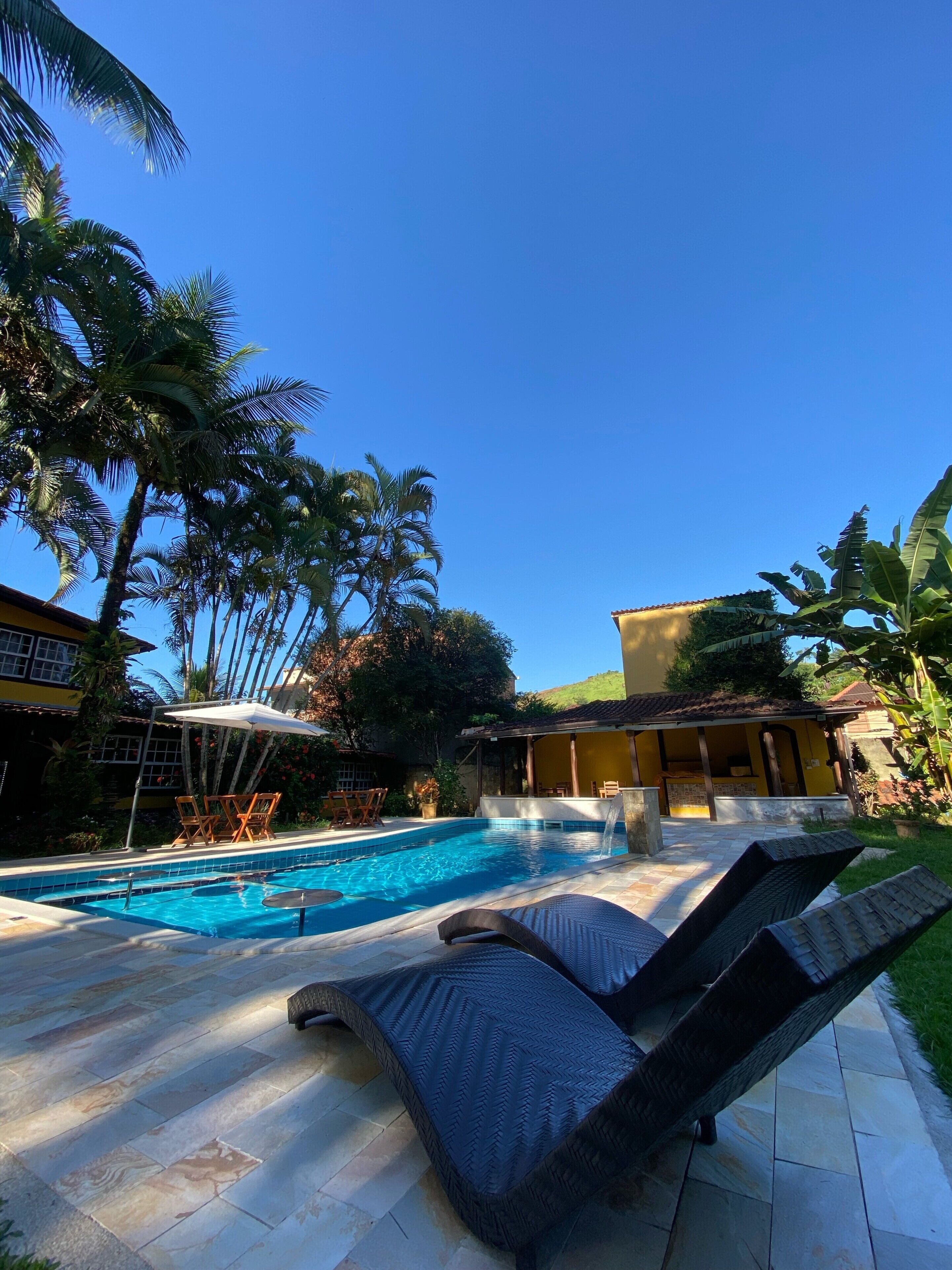 Outdoor pool, open 10:00 AM to 10:00 PM, pool umbrellas, pool loungers