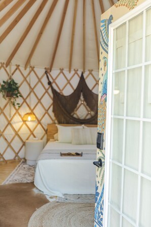 Interior entrance - The Peacock Yurt at Camposanto ATX Glamping on Lake Travis (Lakeway)