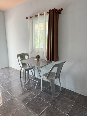 Double Room | Living area | 110-cm Smart TV with digital channels - Sunshine Rest Resort (Ubon Ratchathani)