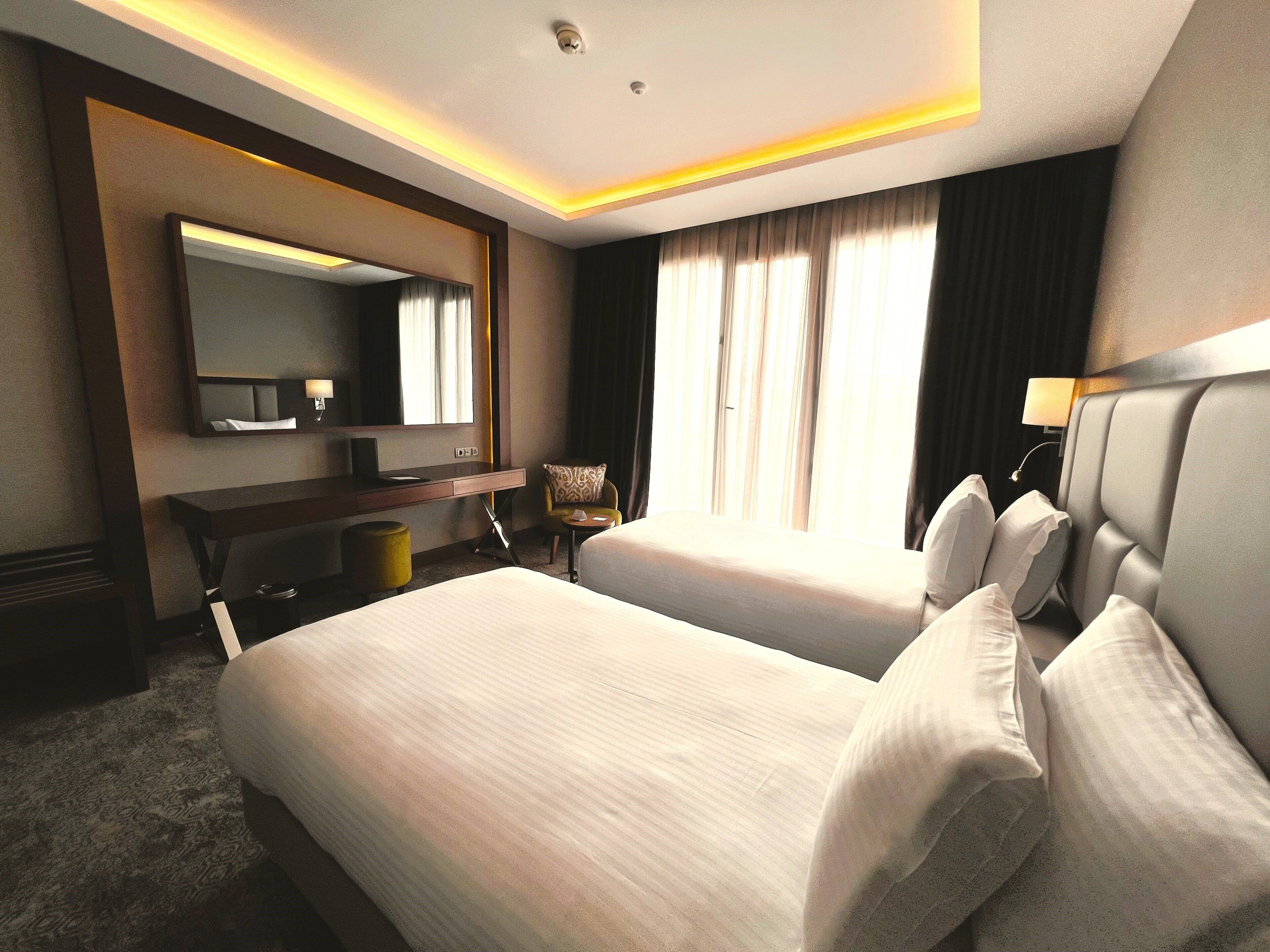 Standardzimmer, 2 Einzelbetten, Balkon | Hochwertige Bettwaren, Zimmersafe, Schreibtisch