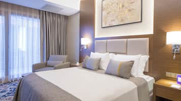 Premium bedding, in-room safe, soundproofing, iron/ironing board