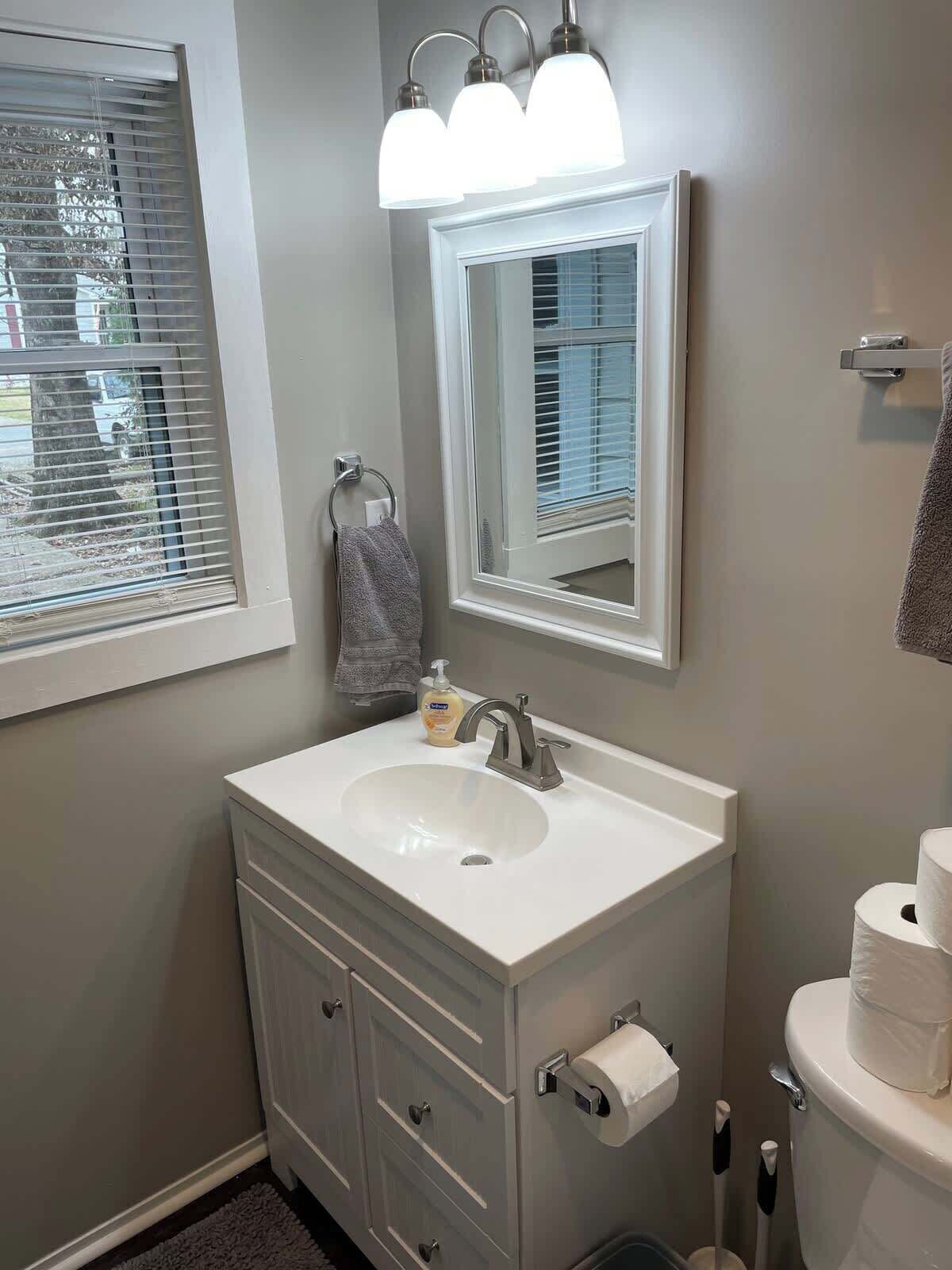 Shower, hair dryer, towels, shampoo