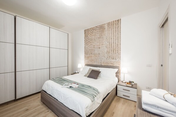 1 غرفة نوم ومكواة/لوح كي وواي فاي وملاءات أسرّة