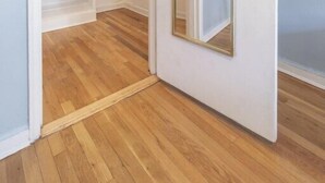A walk-in closet with white shelving and a mirrored closet door. - Amazing 2 BR on Upper East Side NYC (New York)