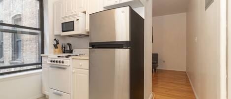 Refrigerador, microondas, horno, placa de cocina