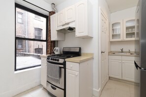 Fridge, microwave, oven, stovetop - Upper East Modern & Chic Two BR Apt near Central Park (New York)