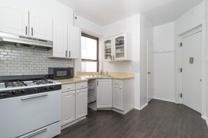 Fridge, microwave, oven, stovetop - Yorkville 2 BR Suit on Upper East Side NYC (Manhattan)