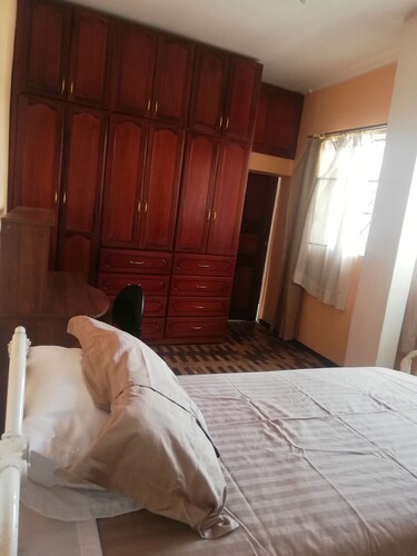 Suite independiente Ideal para viajeros que busquen descansar/trabajar en línea