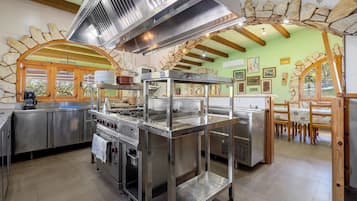 Fridge, stovetop, dishwasher, coffee/tea maker