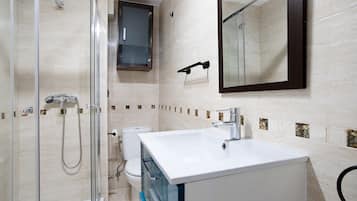Shower, hair dryer, towels