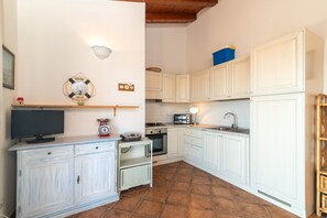 Fridge, stovetop, electric kettle, toaster