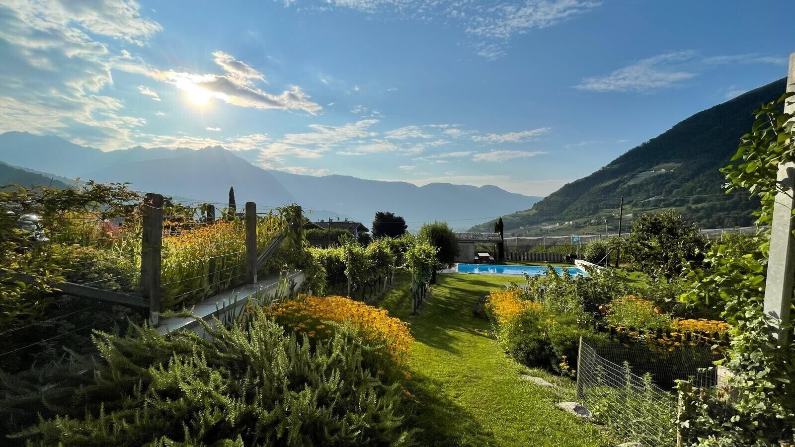Property grounds. Farmhouse 'Fröhlichhof Wohnung Panorama' with Mountain View, Shared Pool and Wi-Fi