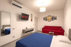 1 bedroom, desk, iron/ironing board, travel crib