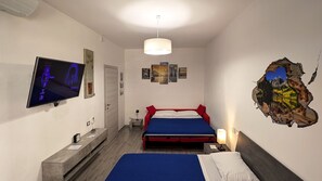 1 bedroom, desk, iron/ironing board, travel crib