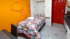 1 bedroom, desk, iron/ironing board, travel cot