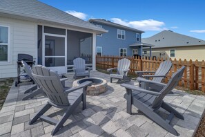 Terrace/patio - "Tenn A Sea" is an immaculate 4BD/2BA with a screened porch, fenced yard & firepit!  Pet Friendly! (Port Saint Joe)