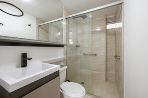 Shower, towels, soap, shampoo