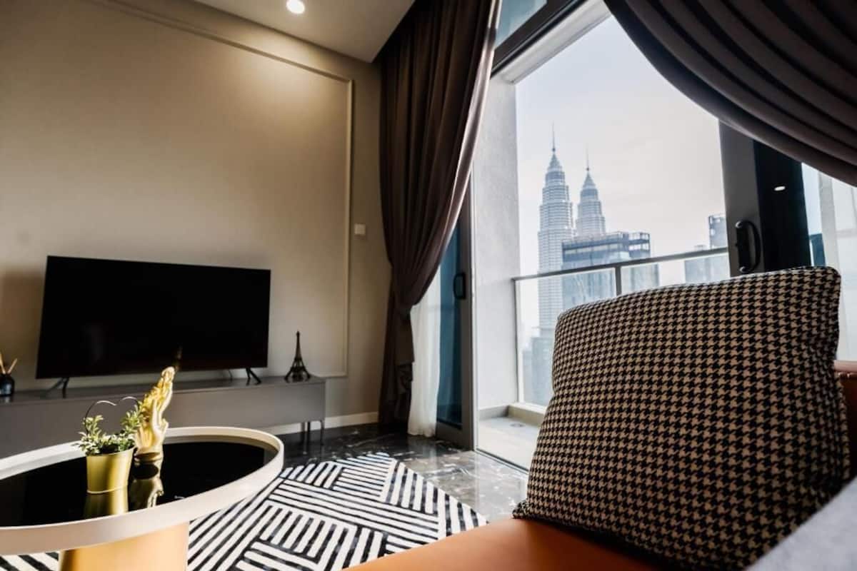 Premium Double or Twin Room, 2 Bedrooms | Living area | 50-inch Smart TV with digital channels, Netflix, streaming services