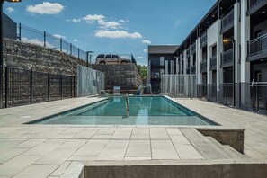 Pool - Stylish Condo with Pool, Gym, Balcony, Close to DT, Long Term Home, Great for Students or Digital Nomads, Less than 10 Mins to Downtown and Five Points,  24 Hr Hospitality (Nashville)