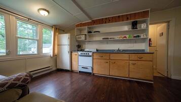 Fridge, microwave, stovetop, cookware/dishes/utensils