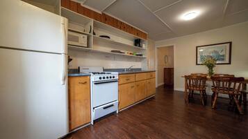 Fridge, microwave, stovetop, cookware/dishes/utensils
