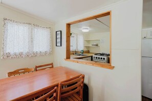 Fridge, microwave, stovetop, cookware/dishes/utensils