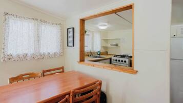 Fridge, microwave, stovetop, cookware/dishes/utensils