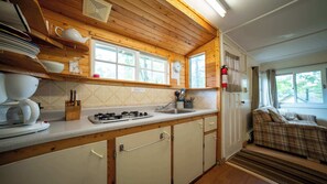 Fridge, microwave, stovetop, cookware/dishes/utensils - 2-Bedroom Cottage #4 - Monterey Pine (Gravenhurst)