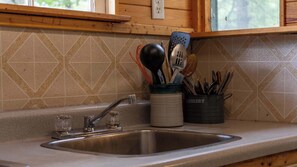 Fridge, microwave, stovetop, cookware/dishes/utensils